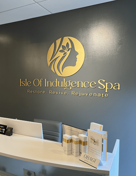 Front desk reception area at Isle of Indulgence Spa in Memphis welcoming clients for med spa and skincare services.